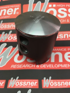 Поршень HUSQVARNA CR/WR 240 '87-'88 (67,44MM=+1,0MM) WOSSNER 8044D100